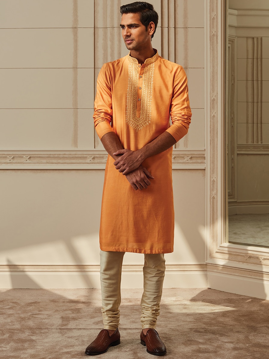 

Tasva Men Orange Ethnic Motifs Yoke Design Embroidered Kurta with Churidar
