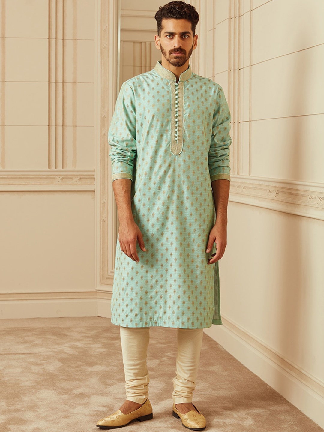 

Tasva Men Turquoise Blue Ethnic Motifs Embroidered Detail Jacquard Kurta with Churidar