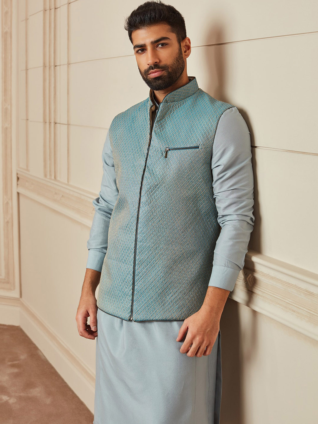 

Tasva Men Turquoise Blue Kurta With Churidar & Quilted Brocade Bundi Jacket