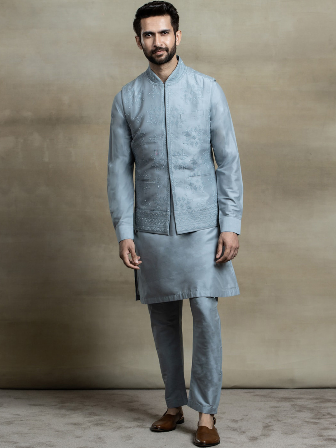 

Tasva Men Blue Kurta With Churidar & Embroidered Bundi Jacket