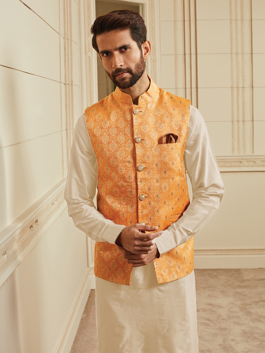 

Tasva Men Orange Jacquard Bundi Kurta with Churidar