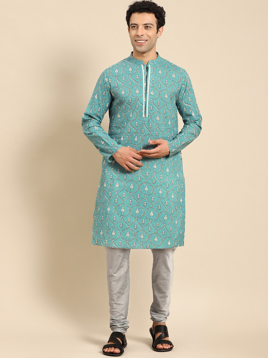 

Amodh by Kisah Men Green Ethnic Motifs Printed Kurta with Churidar