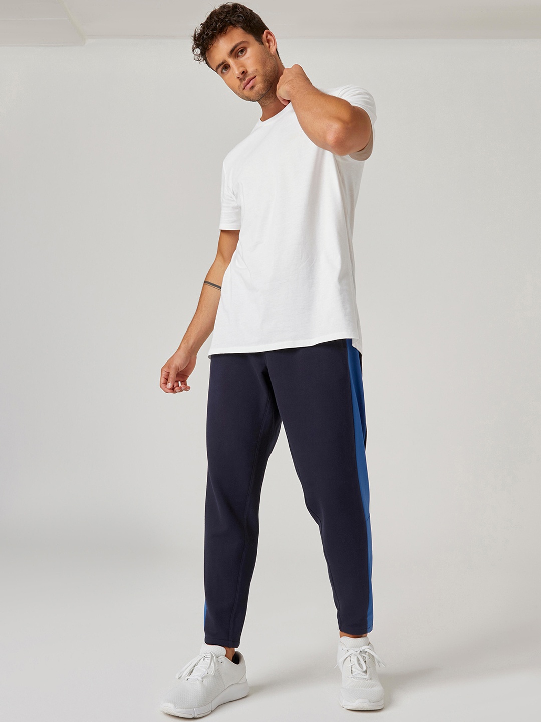 

NYAMBA By Decathlon Men Blue Colourblocked Cotton Track Pants