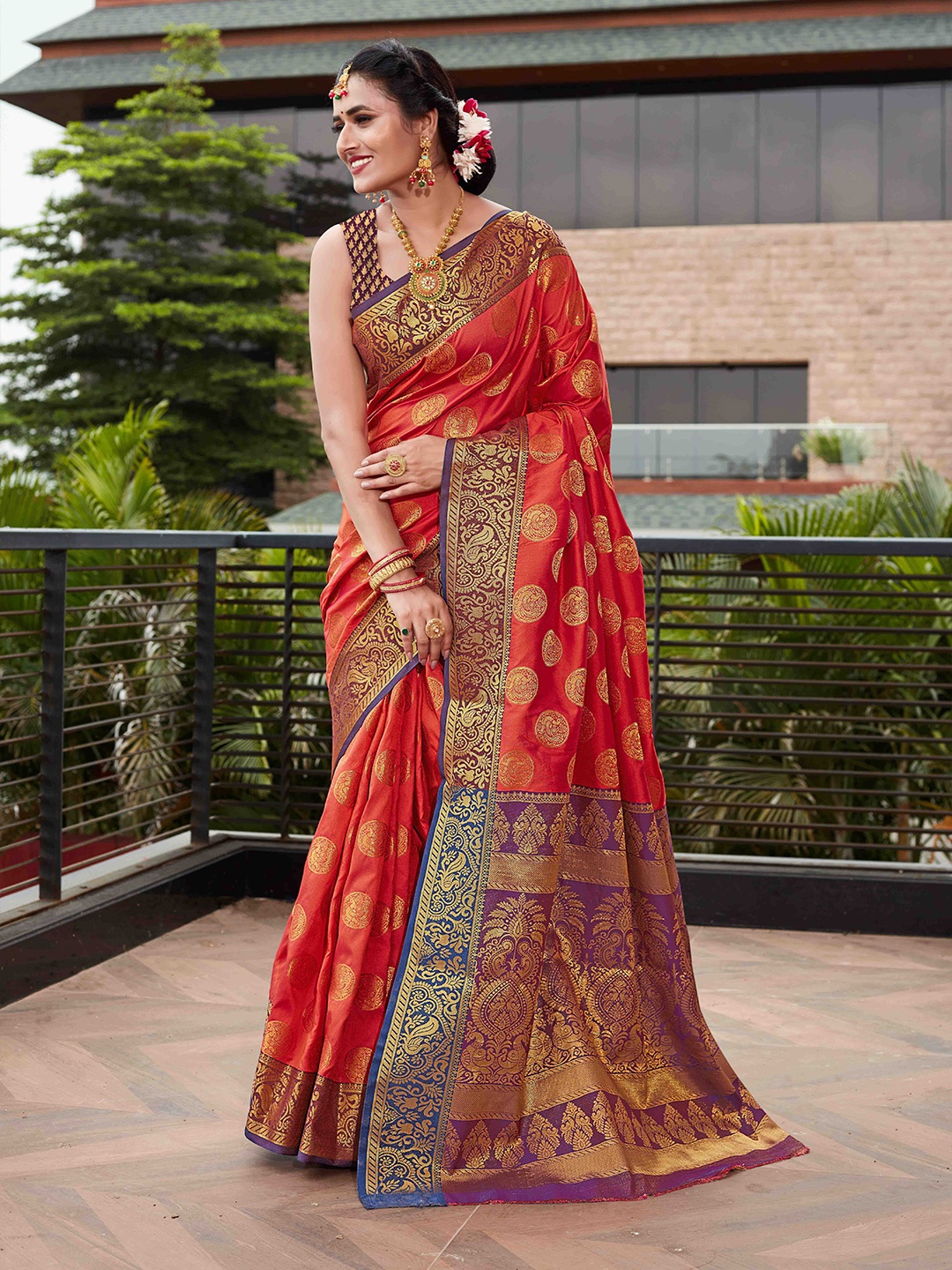 

Mitera Orange & Coffee Brown Ethnic Motifs Zari Silk Blend Kanjeevaram Saree