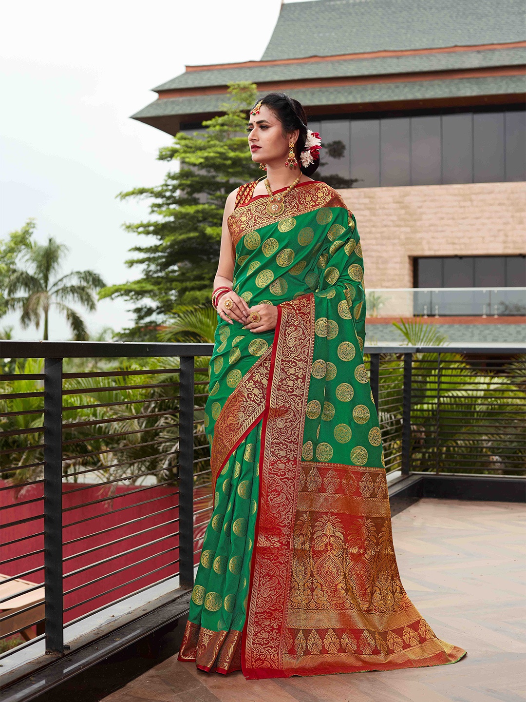 

Mitera Green & Red Ethnic Motifs Zari Silk Blend Kanjeevaram Saree