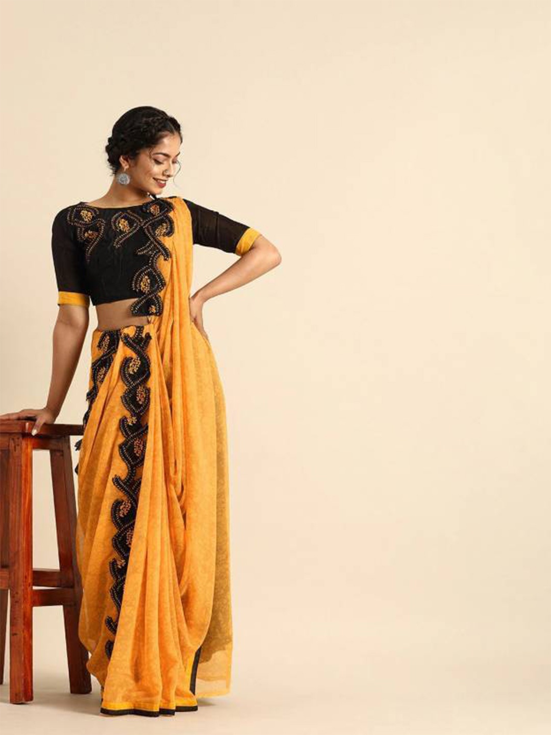 

Sangria Women Mustard Sarees