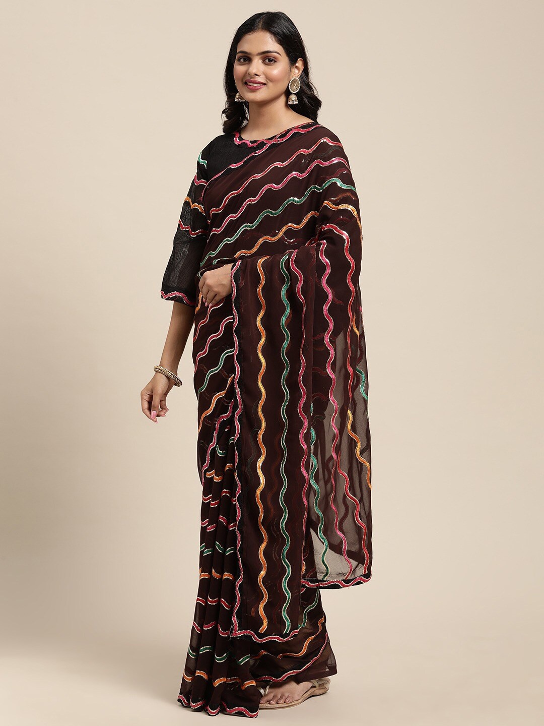 

Sangria Brown & Pink Embellished Sequinned Pure Georgette Saree