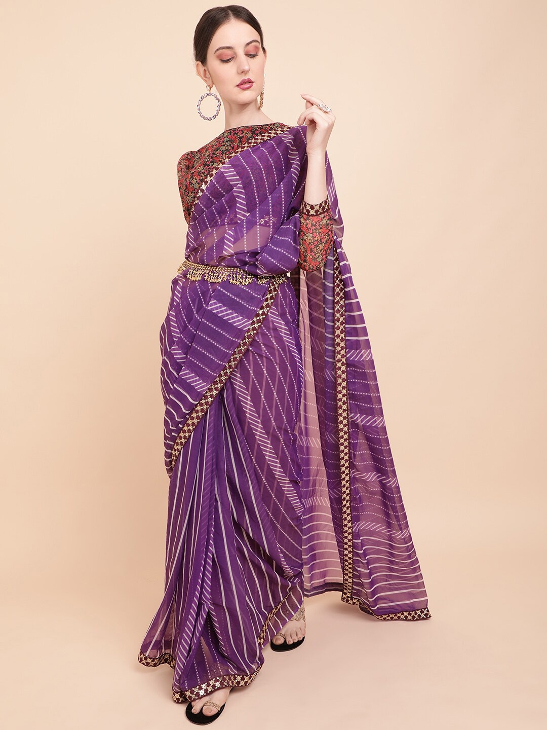 

Sangria Purple & White Striped Sequinned Pure Georgette Saree