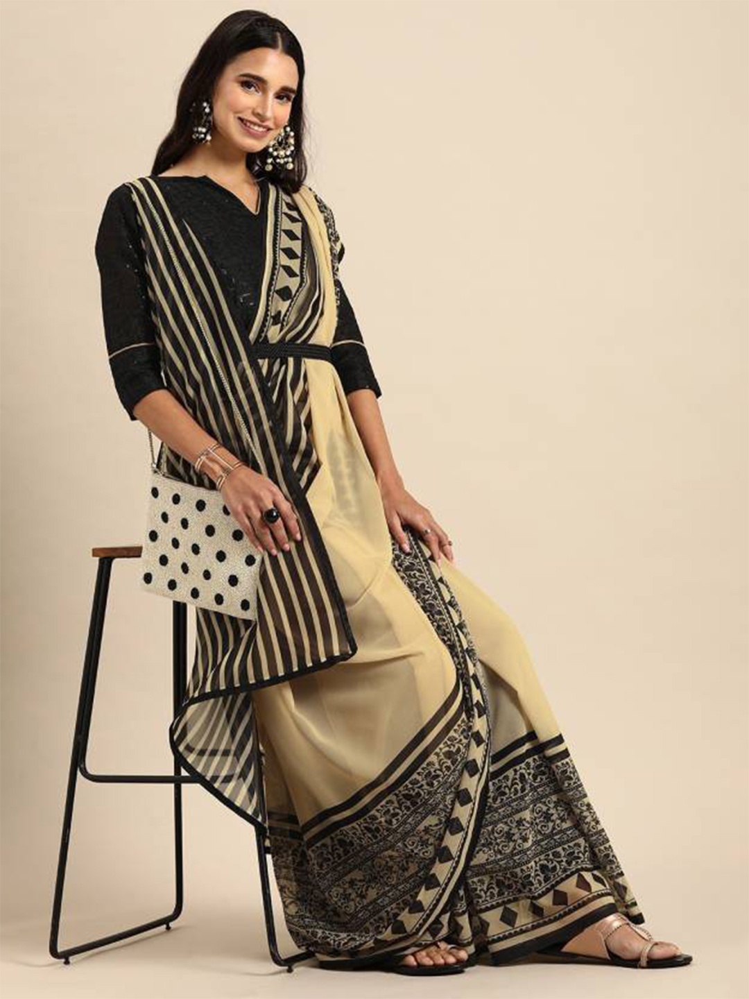 

Sangria Beige & Black Pure Georgette Saree