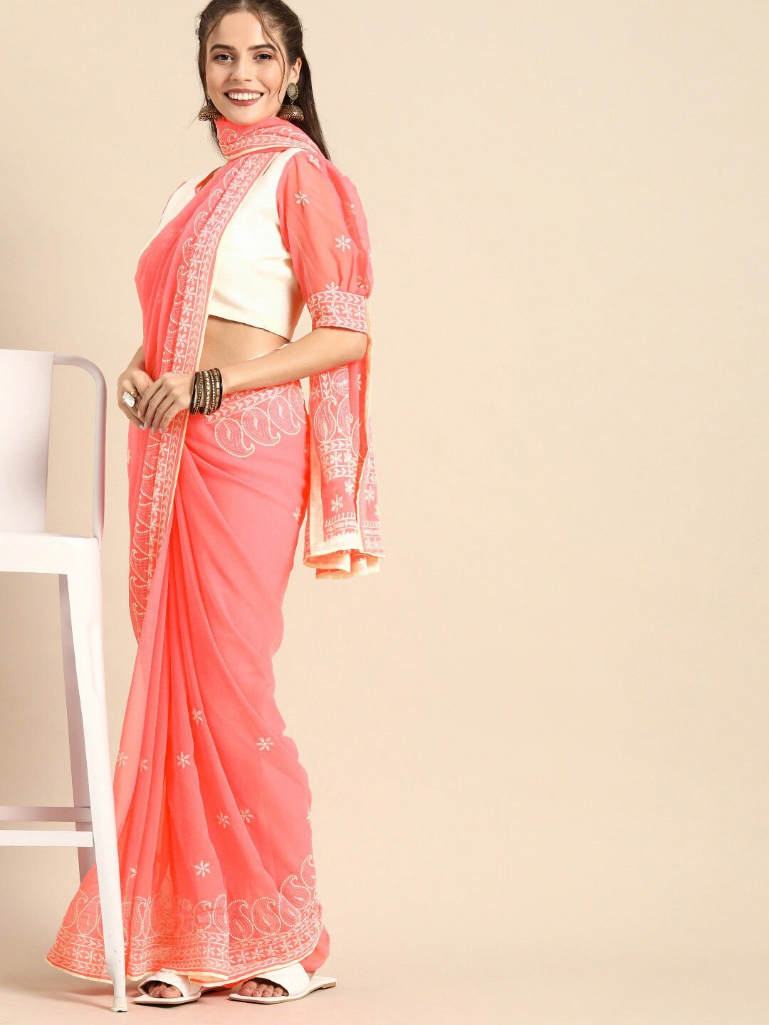 

Sangria Pink & Off White Paisley Sequinned Pure Georgette Saree