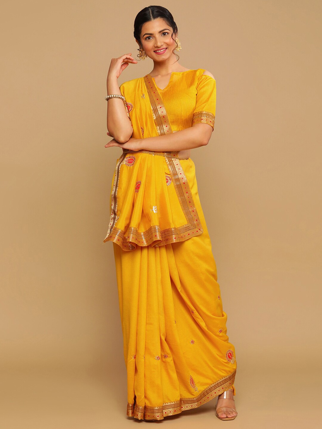 

Satrani Mustard & Red Ethnic Motifs Zari Saree
