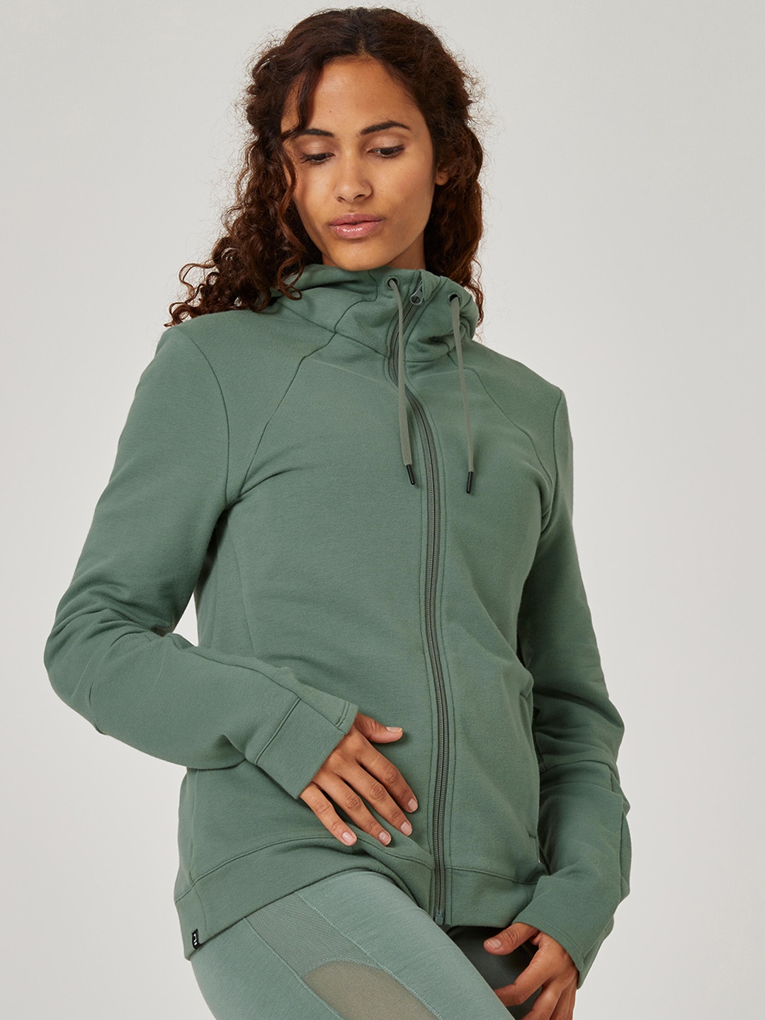 

NYAMBA By Decathlon Women Green Solid Hooded Training or Gym Sporty Jacket