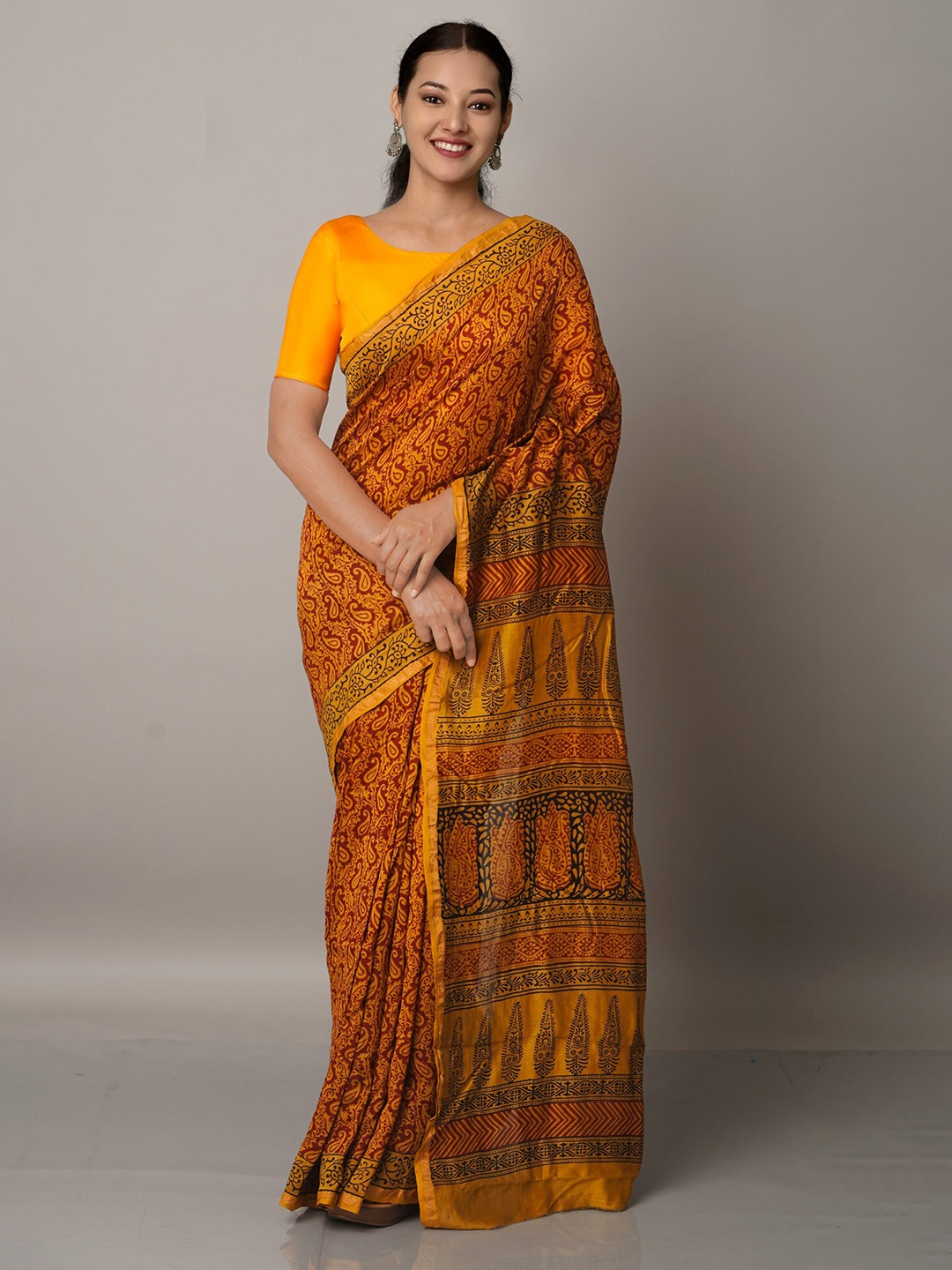 

Unnati Silks Mustard & Maroon Bagh Printed Zari Pure Cotton Chanderi Saree