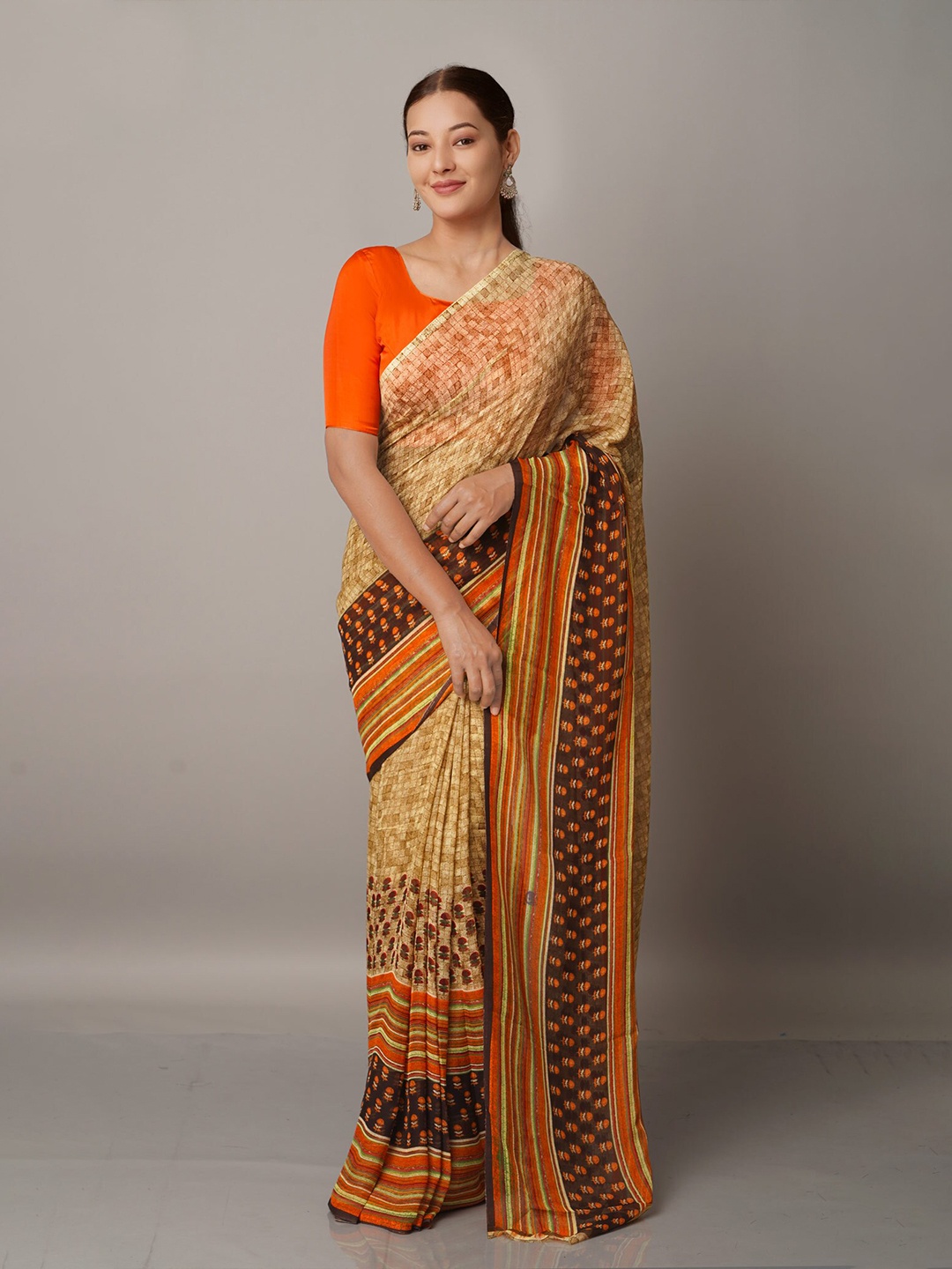 

Unnati Silks Brown & Orange Checked Georgette Block Printed Saree