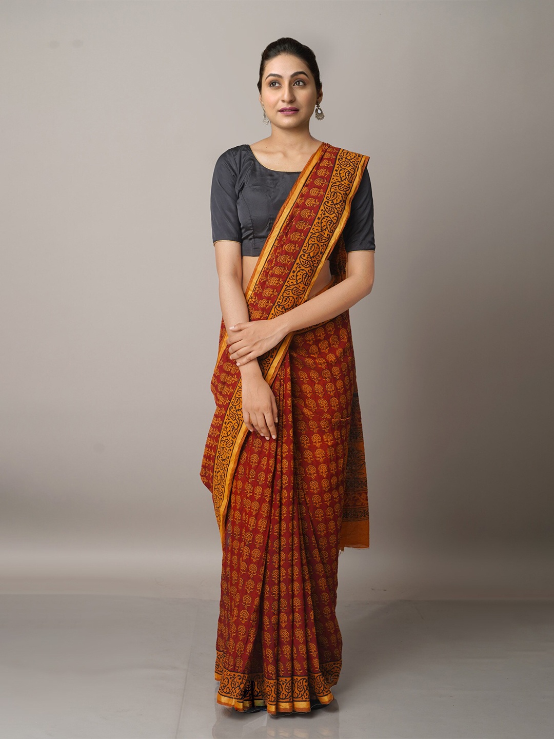

Unnati Silks Maroon & Mustard Bagh Printed Cotton Chanderi Saree