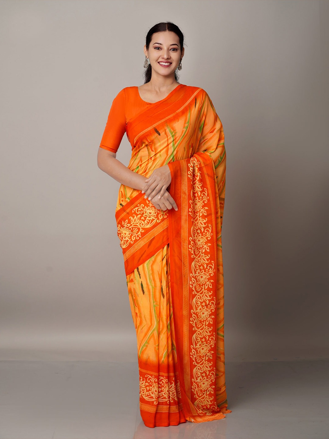 

Unnati Silks Orange & Green Block Printed Georgette Saree