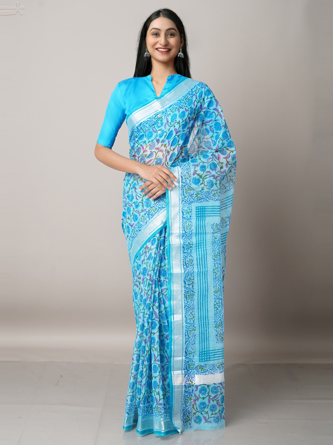 

Unnati Silks Blue & Silver Floral Zari Pure Cotton Kota Saree