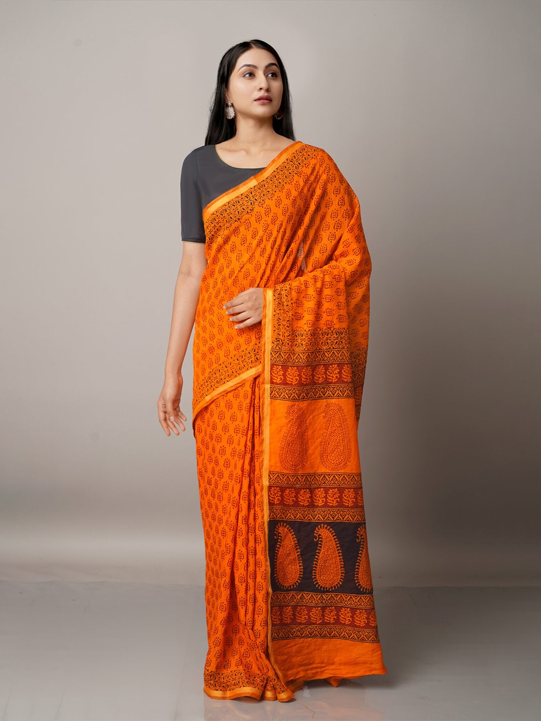 

Unnati Silks Orange & Black Paisley Printed Chanderi Saree