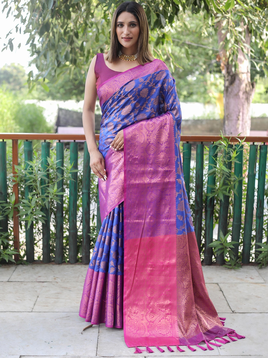 

Mitera Blue & Pink Floral Zari Silk Blend Kanjeevaram Saree