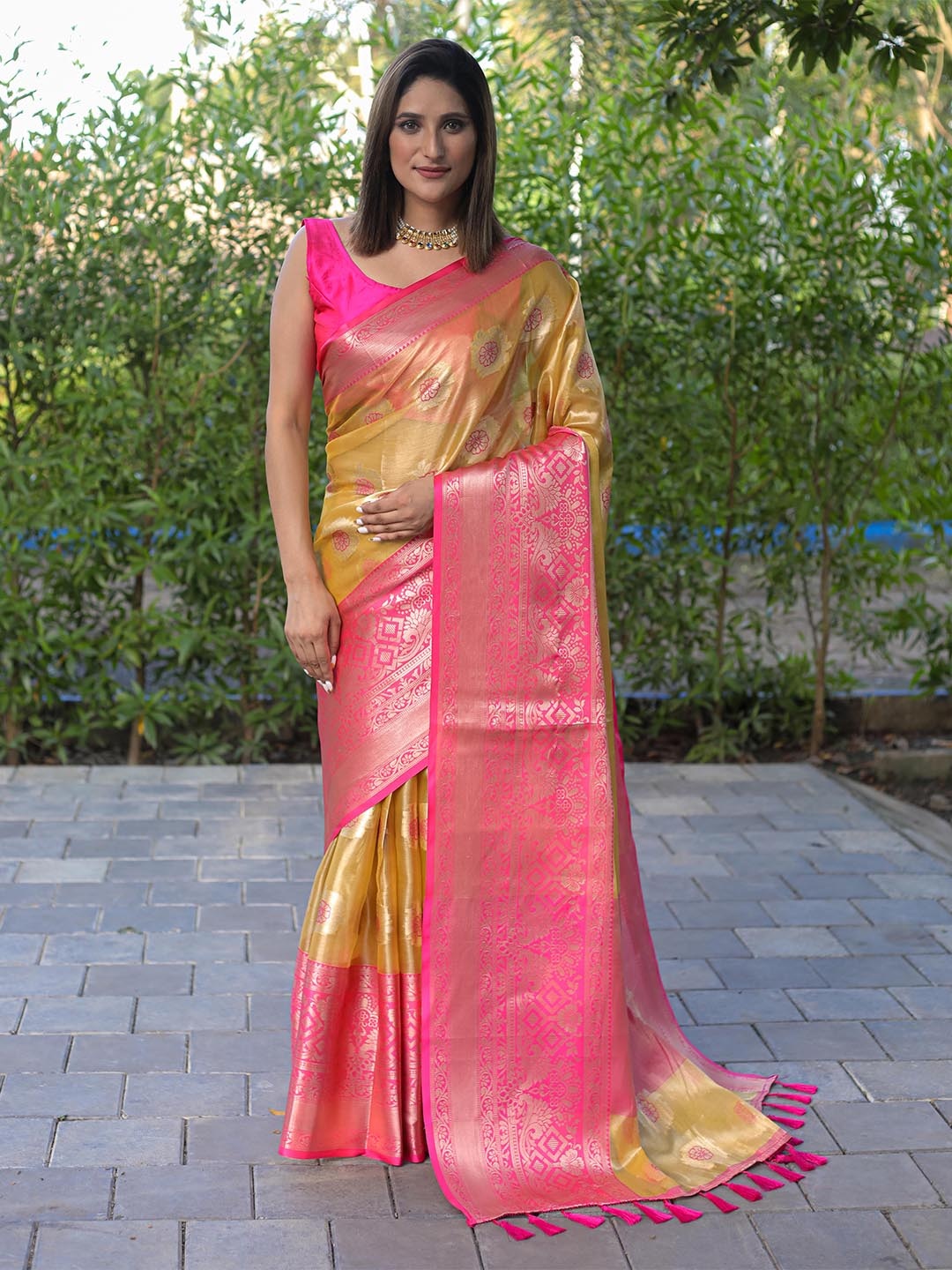 

Mitera Yellow & Pink Floral Zari Silk Blend Kanjeevaram Saree