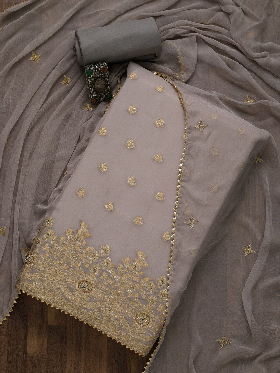 

Koskii Women Grey & Gold-Toned Embellished Unstitched Dress Material