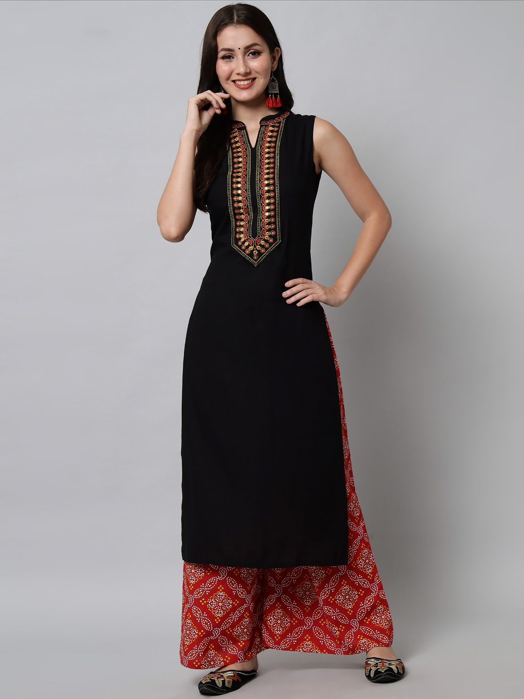 

KALINI Women Black Embroidered Thread Work Kurta with Palazzos