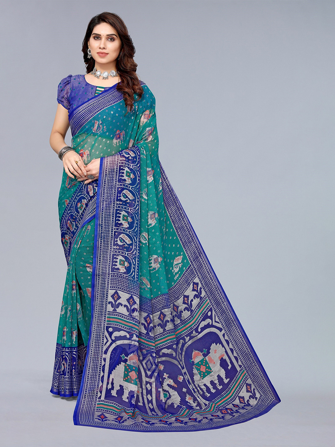 

Winza Designer Teal Green And Blue Bandhani Print Zari Pure Chiffon Block Print Saree