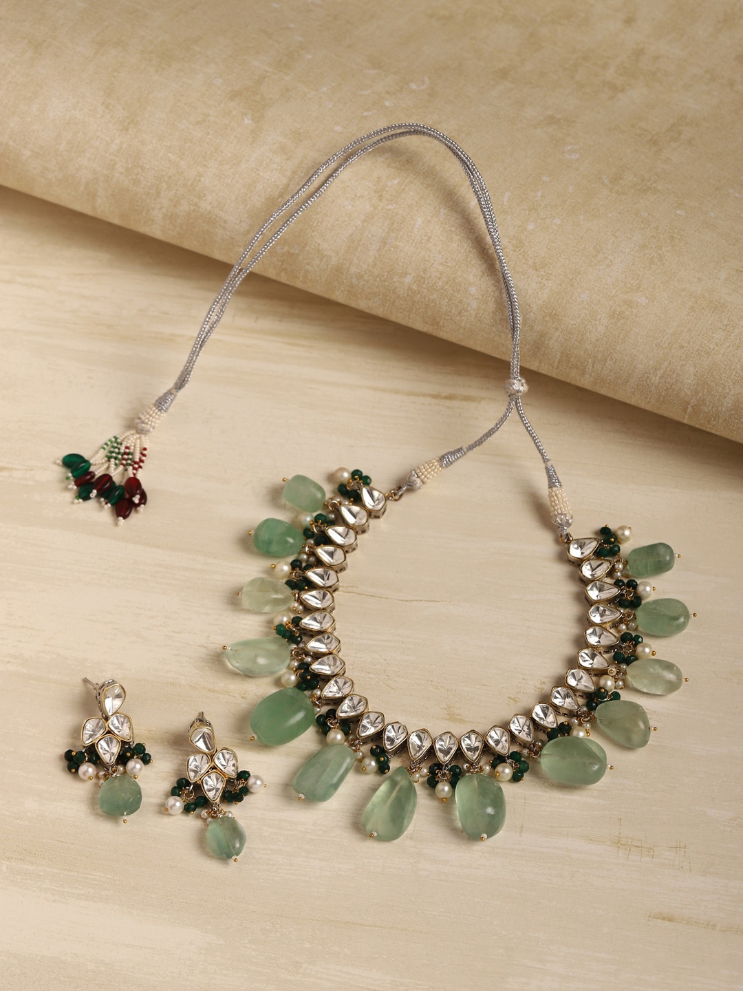 

RITU SINGH Gold-Plated Green Kundan-Studded & Beaded Jewellery Set