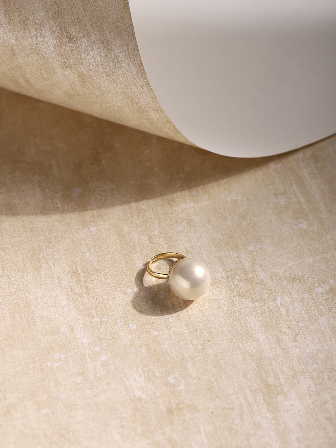 

RITU SINGH Women Gold-Plated Cream-coloured Pearl Beaded Adjustable Finger Ring