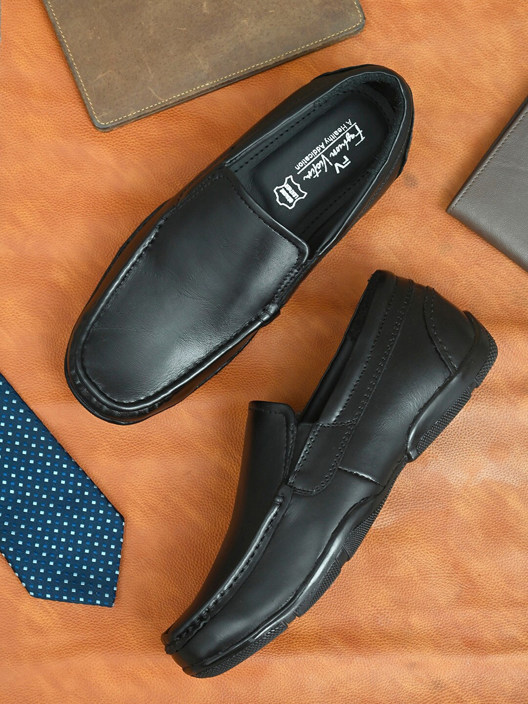 

Fashion Victim Men Black Solid Formal Loafers