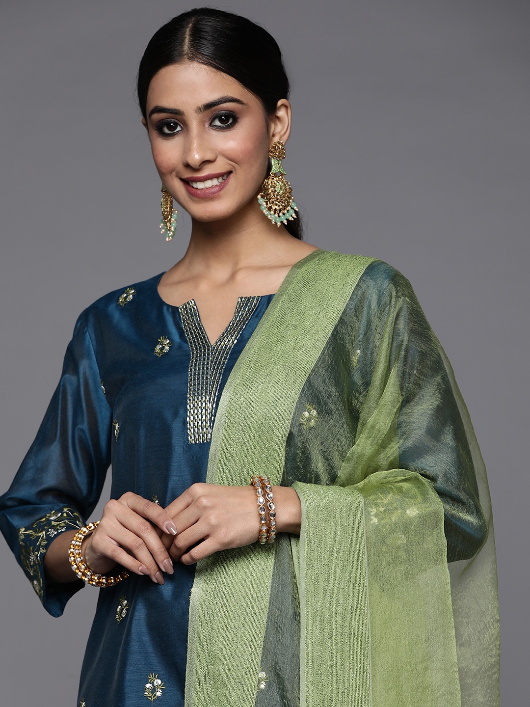 

Varanga Women Navy Blue Floral Embroidered Thread Work Kurta with Trousers & With Dupatta