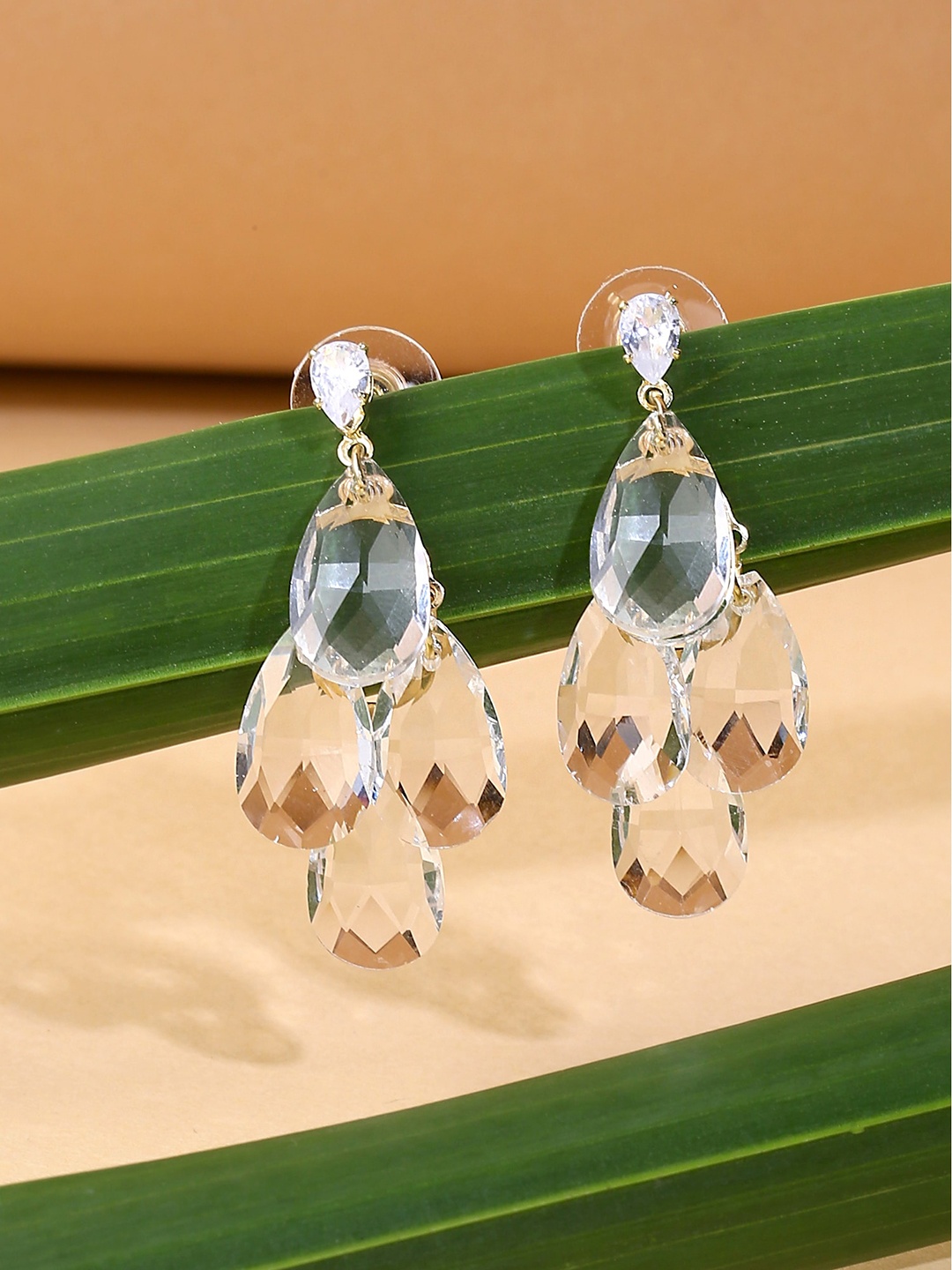 

Yellow Chimes Women Transparent & Gold-Toned Teardrop Shaped Drop Earrings