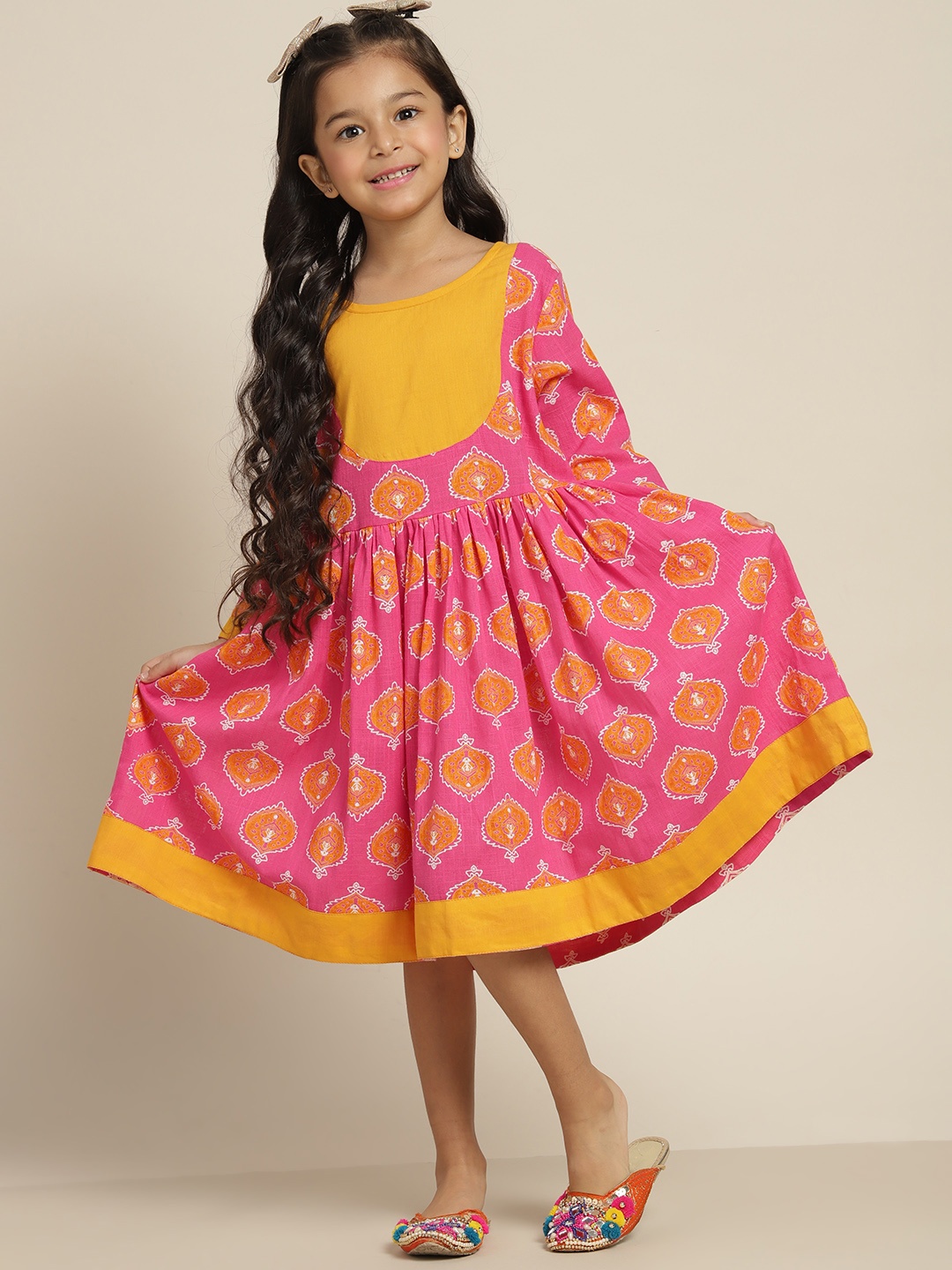 

Sangria Girls Pink & Yellow Pure Cotton Ethnic Motifs Print Fit & Flare Knee Length Dress