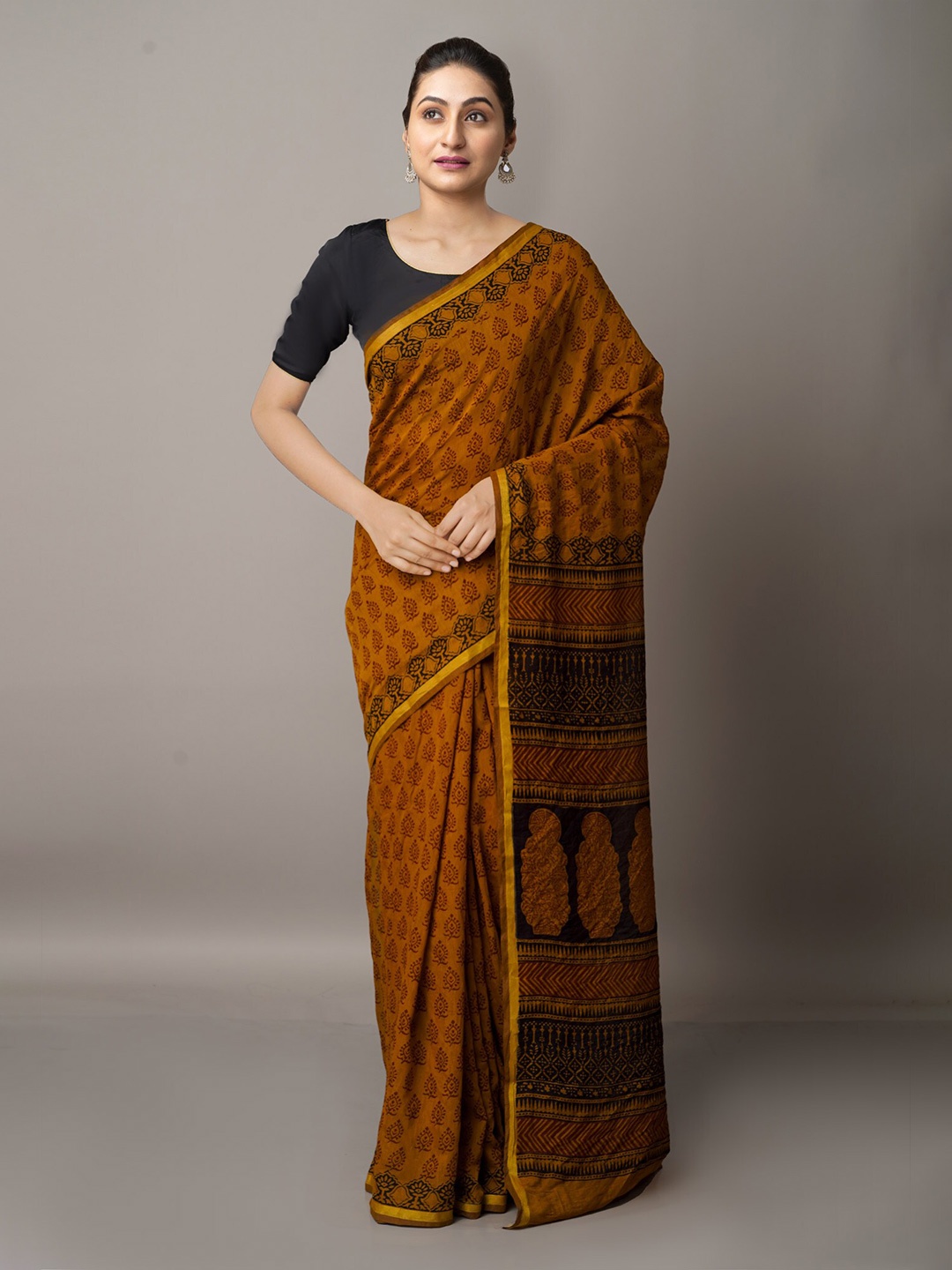 

Unnati Silks Rust & Black Ethnic Motifs Zari Chanderi Saree