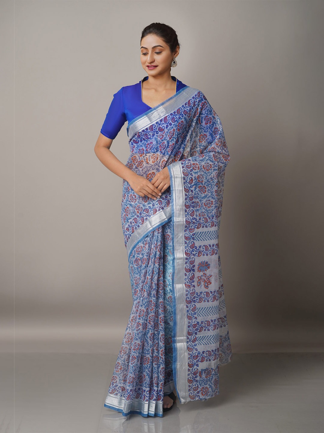 

Unnati Silks Blue & Silver-Toned Floral Zari Pure Cotton Kota Saree