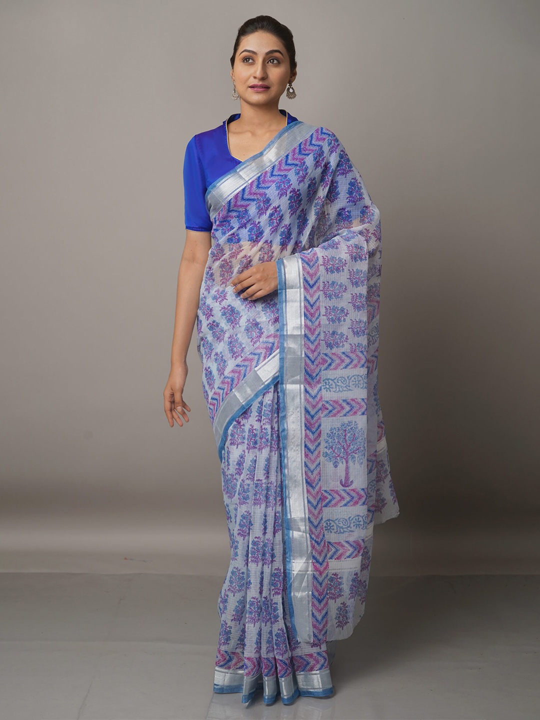 

Unnati Silks Blue & Purple Ethnic Motifs Zari Pure Cotton Kota Saree