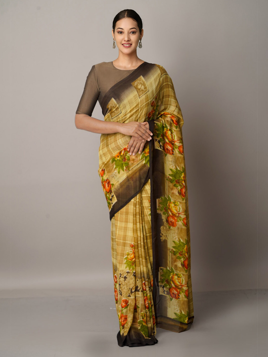 

Unnati Silks Brown & Green Floral Printed Saree
