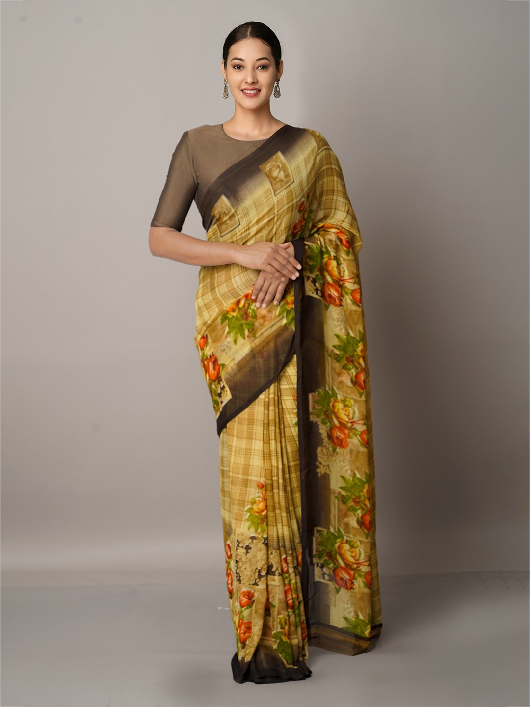 

Unnati Silks Brown & Orange Floral Printed Saree