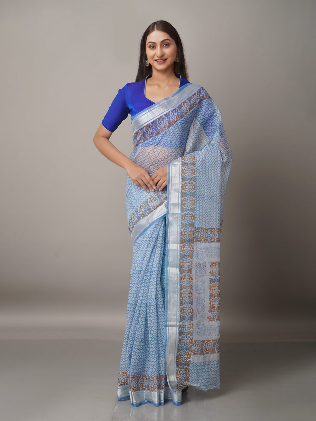 

Unnati Silks Blue & Silver-Toned Floral Zari Pure Cotton Kota Saree