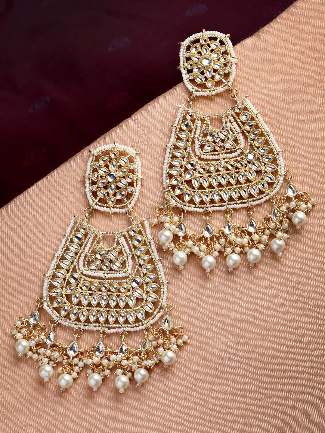 

PANASH Women Gold-Toned & White Contemporary Chandbalis Earrings