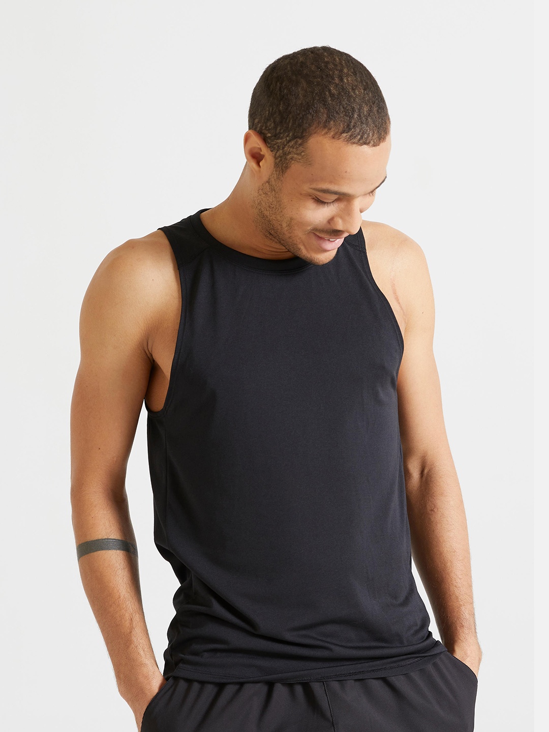 

Domyos By Decathlon Men Black Slim Fit Sleeveless T-shirt