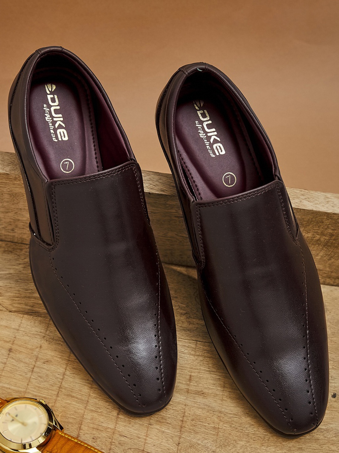 

Duke Men Maroon Solid Formal Slip-On Shoes