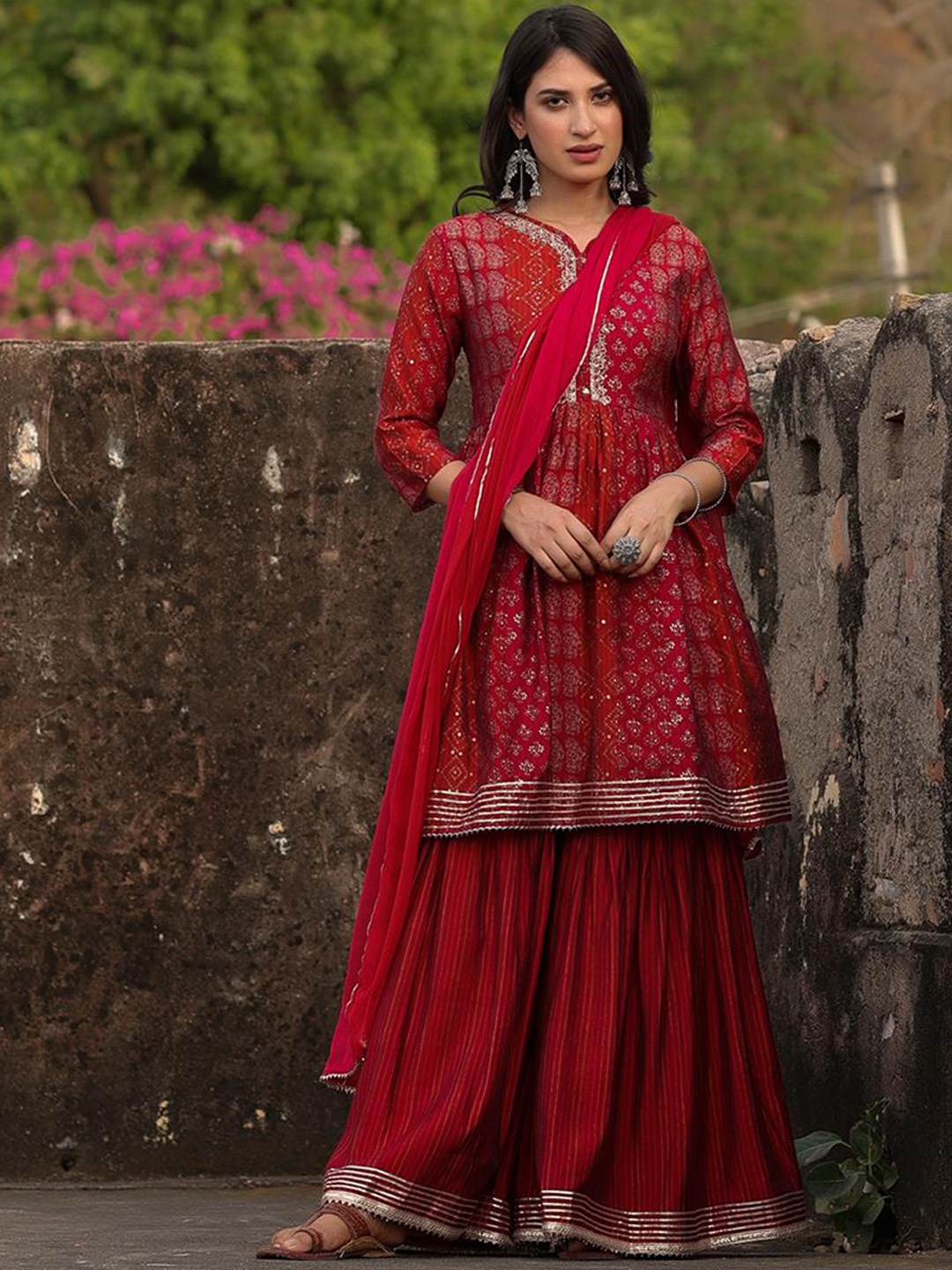 

SCAKHI Women Printed Silk Blend Empire Kurta with Sharara & With Dupatta, Maroon