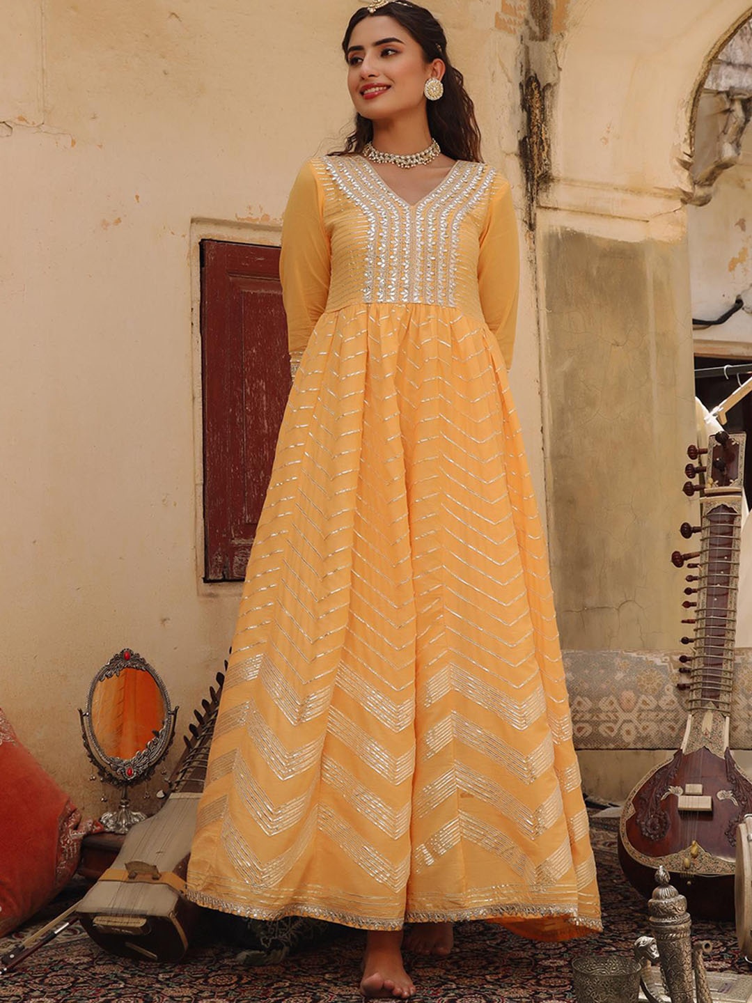 

SCAKHI Women Yellow Geometric Embellished Pastels Cotton Anarkali Kurta