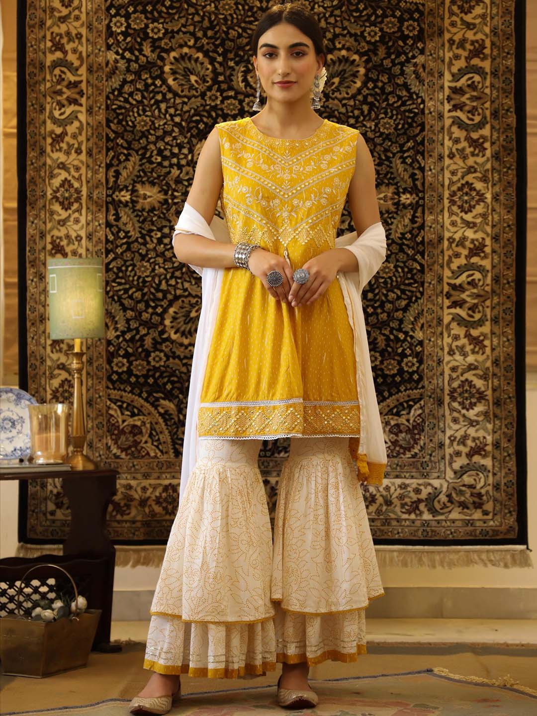 

SCAKHI Women Floral Embroidered Empire Mirror Work Kurti with Sharara & Dupatta, Mustard