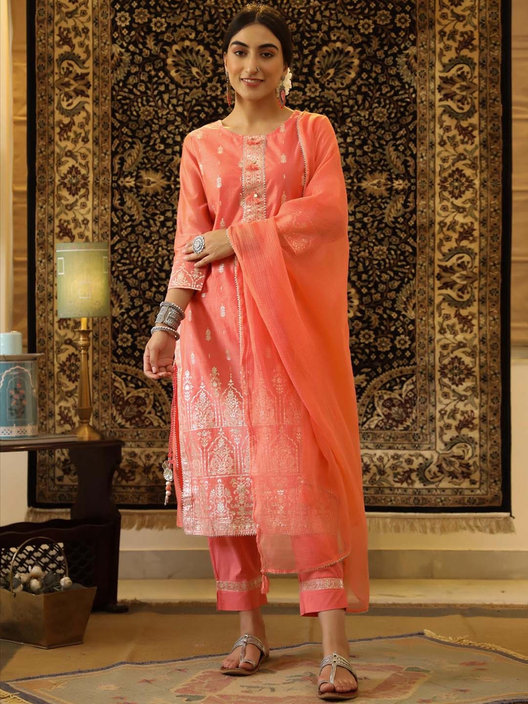 

SCAKHI Women Peach Embroidered Chanderi Silk Straight Kurta with Trousers & With Dupatta