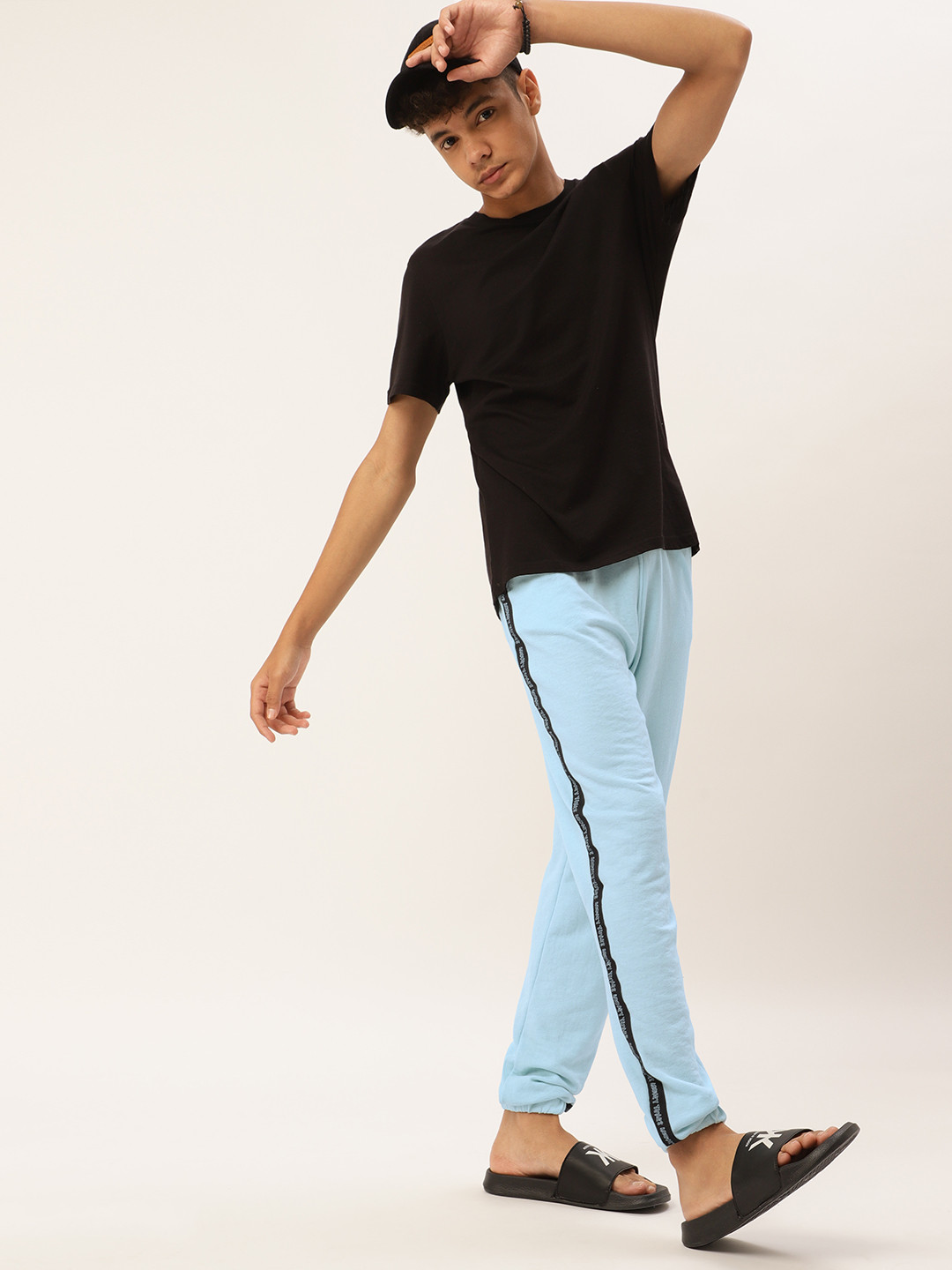 

Kook N Keech Looney Tunes Teens Boys Blue & Black Solid Joggers with Side Taping
