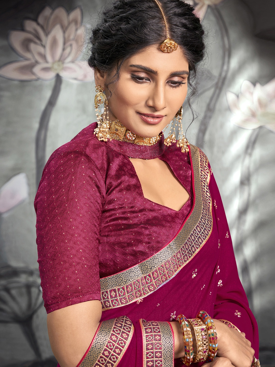 

Satrani Maroon & Gold Embroidered Silk Blend Saree