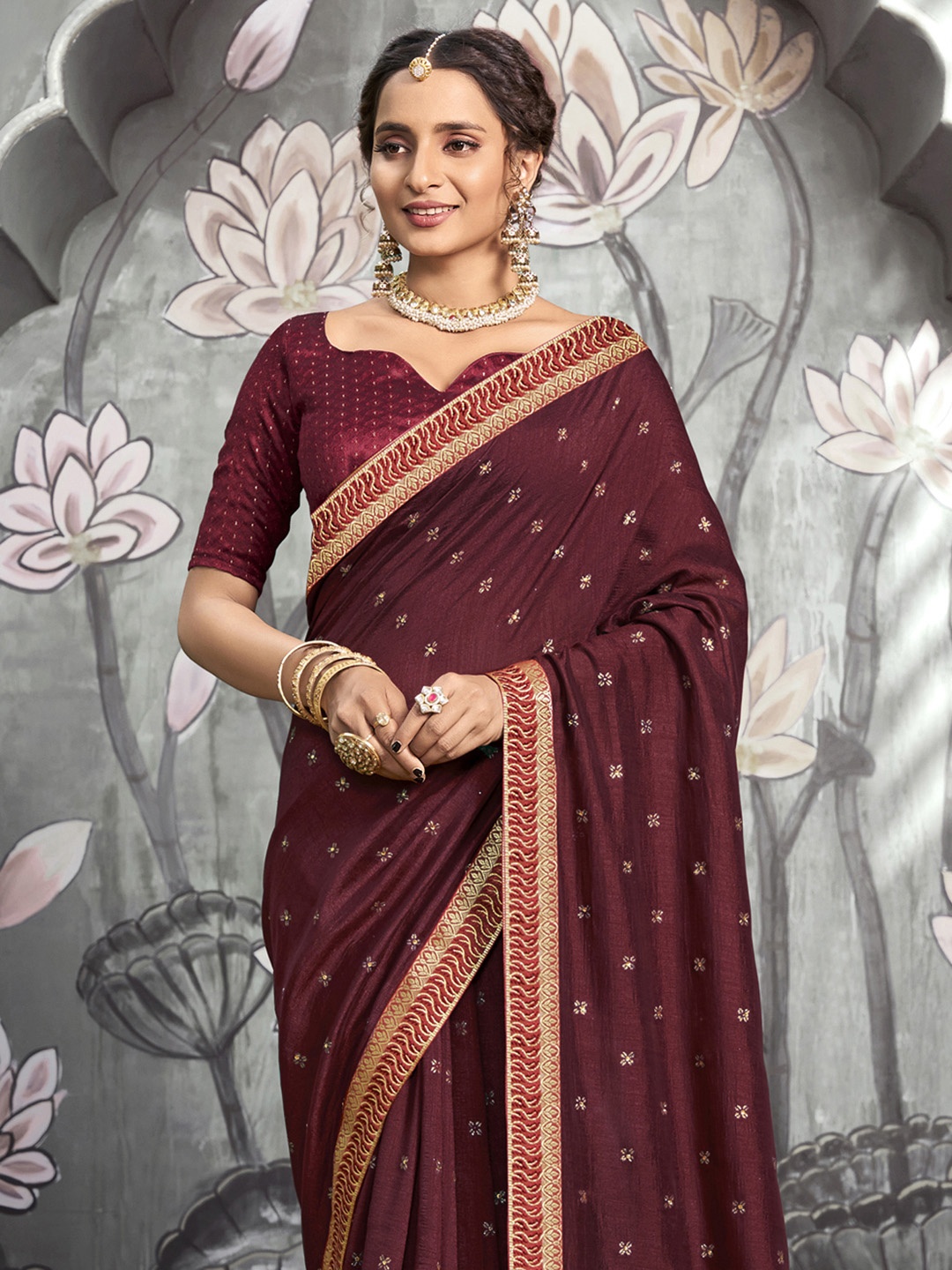 

Satrani Maroon & Gold Embroidered Silk Blend Saree