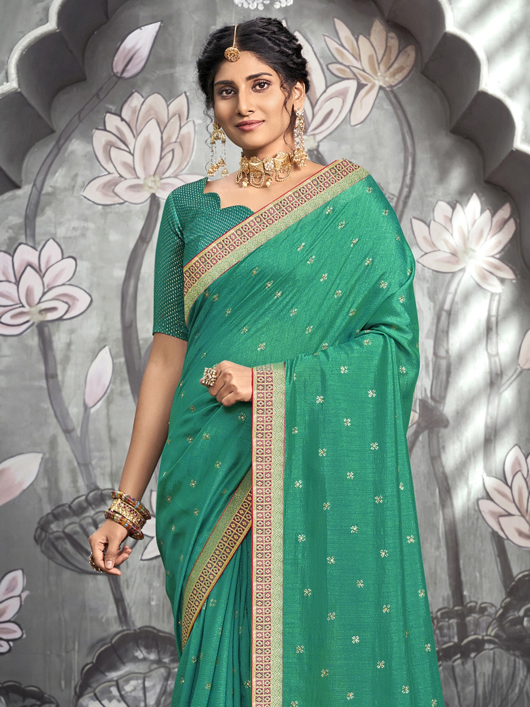 

Satrani Green & Gold Embroidered Silk Blend Saree